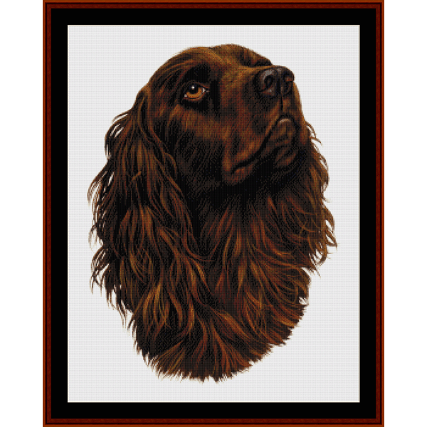 Counted Cross Stitch Pattern by Cross Stitch Collectibles depicting the head of a brown dog