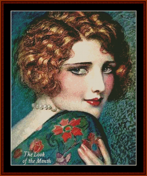 Counted Cross Stitch Pattern by Cross Stitch Collectibles - Vintage-style illustration of a woman with a floral garment, labeled 'The Look of the Month'.