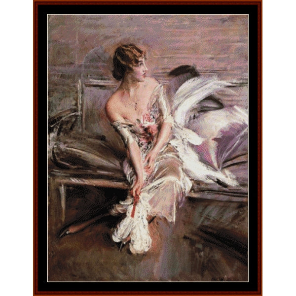 Counted Cross Stitch Pattern by Cross Stitch Collectibles of a woman in a floral dress sitting on a bench with a fan.