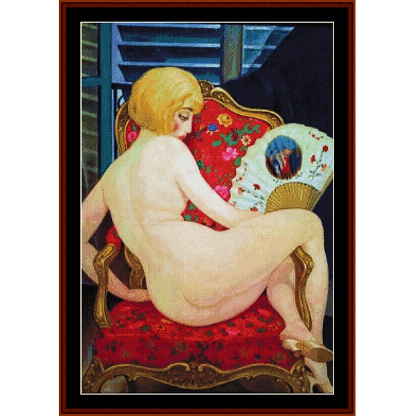Counted Cross Stitch Pattern by Cross Stitch Collectibles of a nude figure sitting on a red chair with a fan, framed in a dark border.