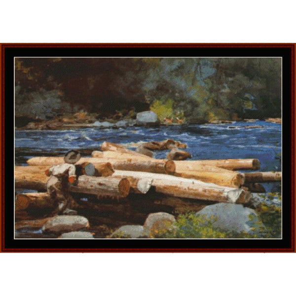 Counted Cross Stitch Pattern by Cross Stitch Collectibles of logs by a river with a dark frame
