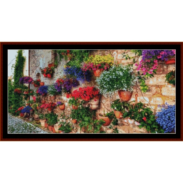 Counted Cross Stitch Pattern by Cross Stitch Collectibles - Colorful floral arrangement with pots against a stone wall