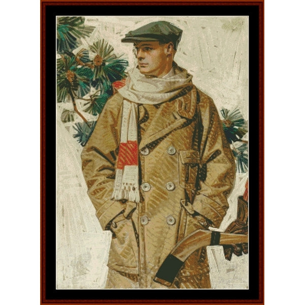 Vintage-style Counted Cross Stitch Pattern by Cross Stitch Collectibles of a man in a coat and hat with a scarf