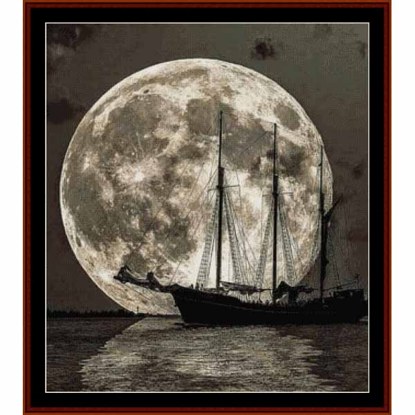Counted Cross Stitch Pattern: Moonlit Voyage, Fantasy - Cross Stitch Collectibles - A framed art print depicting a large, detailed full moon over a dark silhouette of a sailing ship on water, with a dark brown border.