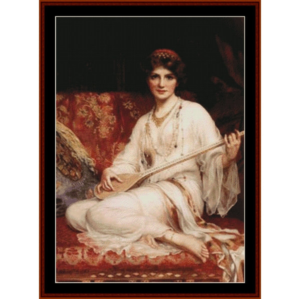 Counted Cross Stitch Pattern: Odalisque by Emile Vernon - Cross Stitch Collectibles - A framed classical painting depicting a seated woman in flowing white garments holding a stringed instrument, with warm red and gold upholstery in the background
