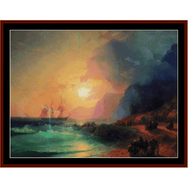 Counted Cross Stitch Pattern: On the Island of Crete, 1867 by Ivan Aivazovsky - Cross Stitch Collectibles - A framed landscape painting depicting a dramatic sunset over the ocean, with a ship on the left, dark clouds on the right, and figures along the shoreline.