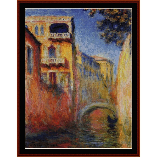 Counted Cross Stitch Pattern – Rio della Salute by Claude Monet - Cross Stitch Collectibles - Impressionist-style framed painting of a Venetian canal scene with warm-toned buildings, blue sky, and an arched bridge
