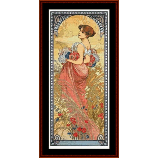 Counted Cross Stitch Pattern – Seasons 1900, Summer by Alphonse Mucha - Cross Stitch Collectibles - A framed art print featuring an Art Nouveau style illustration of a woman in a flowing pink dress standing in a field of red flowers under a golden sun.
