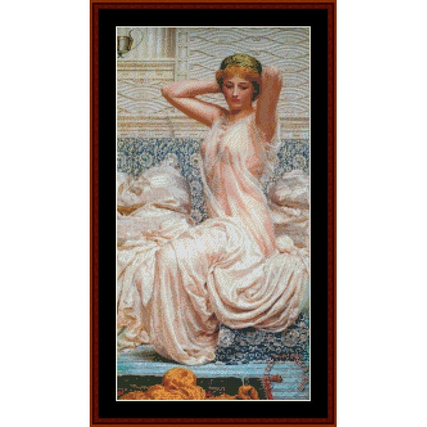 Counted Cross Stitch Pattern – Silver by A.J. Moore - Cross Stitch Collectibles - A framed art print featuring a classical painting of a woman in a flowing pale pink gown, seated against a patterned blue and cream background