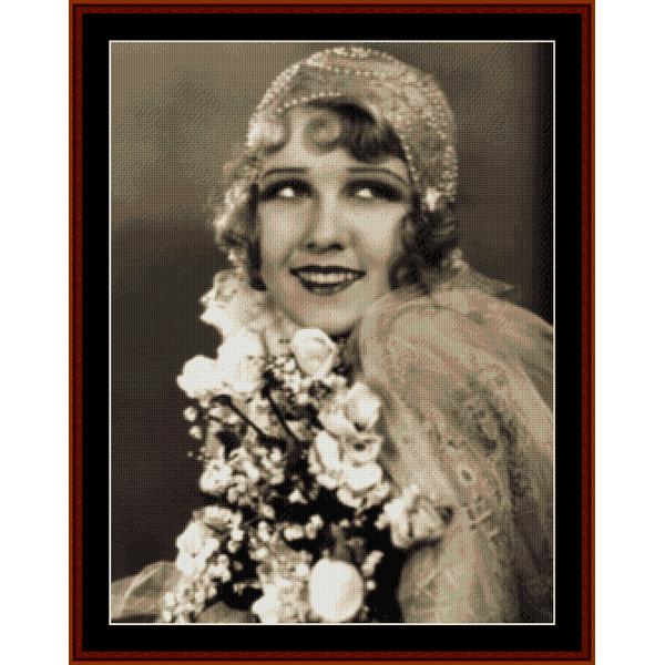 Vintage-style Counted Cross Stitch Pattern by Cross Stitch Collectibles of a woman holding flowers