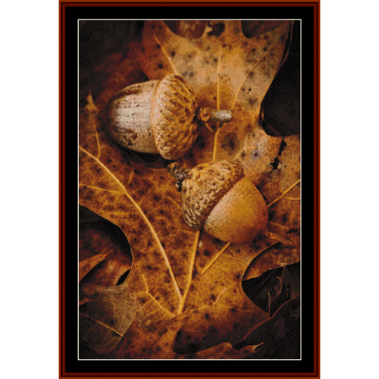 Counted Cross Stitch Pattern by Cross Stitch Collectibles  featuring acorns and leaves on a brown background, indicating a fall-themed design.