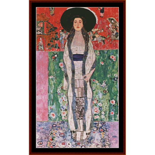 Colorful Counted Cross Stitch Pattern by Cross Stitch Collectibles of a woman with a floral background