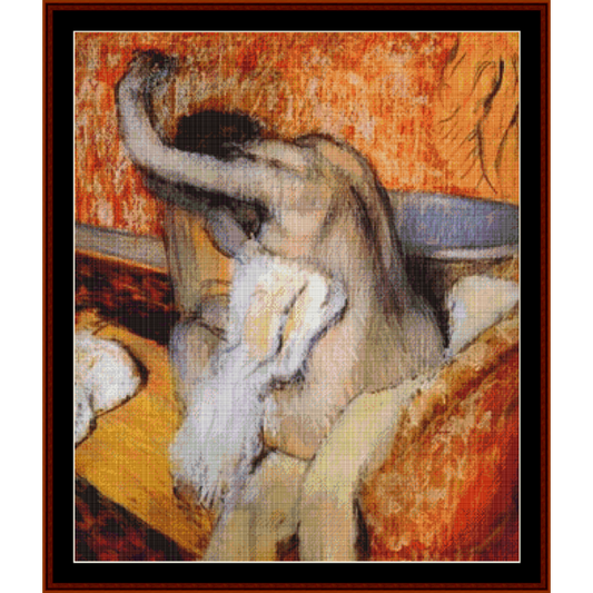 Counted Cross Stitch Pattern by Cross Stitch Collectibles of a nude figure with a textured orange background
