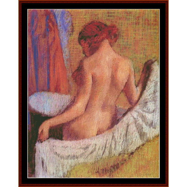 Counted Cross Stitch Pattern by Cross Stitch Collectibles of a nude figure sitting on a towel with a colorful curtain in the background.