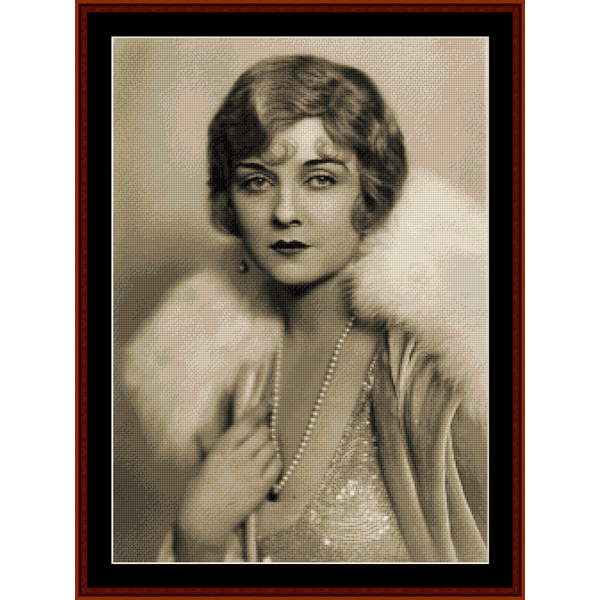 Counted Cross Stitch Pattern by Cross Stitch Collectibles - Vintage-style portrait of a woman with a feathered boa and pearl necklace, framed in brown.