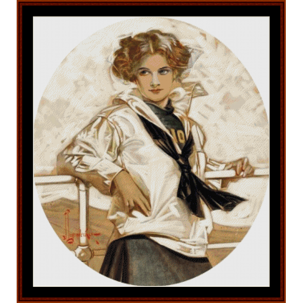 Vintage-style Counted Cross Stitch Pattern by Cross Stitch Collectibles of a woman in a white coat with a black sash, standing on a boat.
