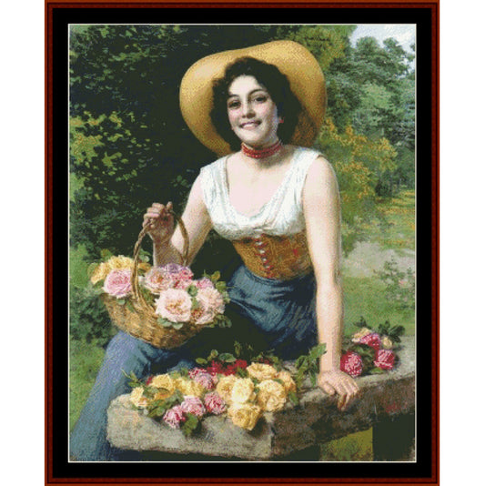 Counted Cross Stitch Pattern by Cross Stitch Collectibles depicting a woman holding a basket of flowers, seated beside a larger arrangement of flowers on a table.