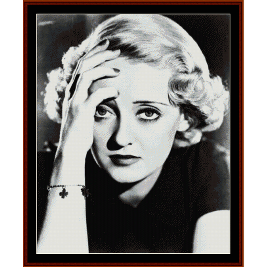 Counted Cross Stitch Pattern by Cross Stitch Collectibles of A vintage black and white photo of Bette Davis with a subtle color gradient at the top.