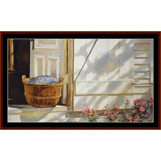 Cross Stitch Pattern by Cross Stitch Collectibles of a Basket of flowers on a windowsill with sunlight filtering through