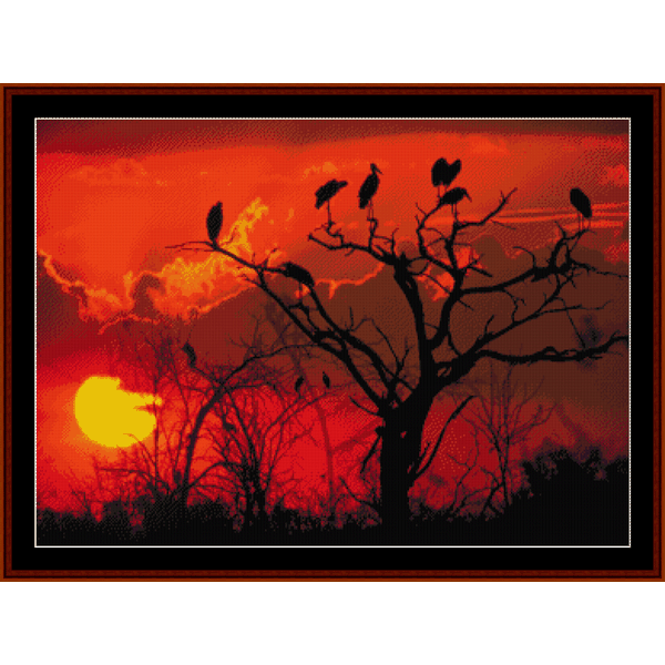Counted Cross Stitch Pattern by Cross Stitch Collectibles depicting a sunset with birds perched on trees.