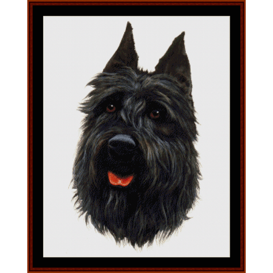 Counted Cross Stitch Pattern by Cross Stitch Collectibles depicting the head of a black dog with a red tongue