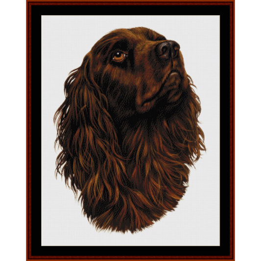 Counted Cross Stitch Pattern by Cross Stitch Collectibles depicting the head of a brown dog