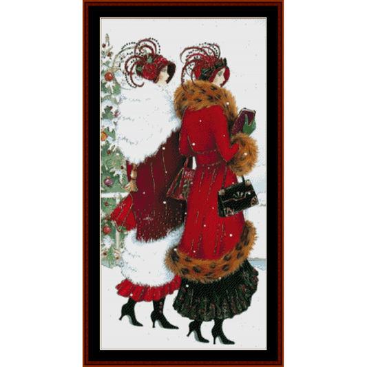 Counted Cross Stitch Pattern by Cross Stitch Collectibles featuring illustrated women in vintage holiday attire, with a Christmas tree and festive decorations in the background.