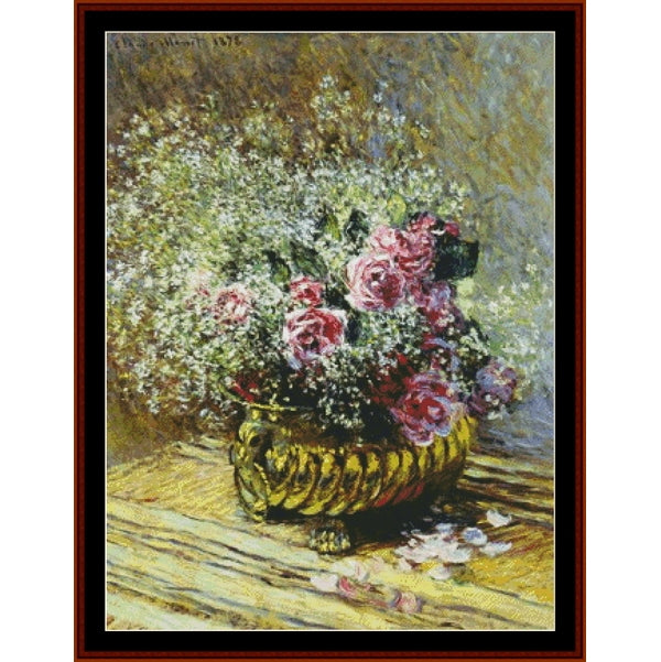 Counted Cross Stitch Pattern by Cross Stitch Collectibles of a vase with flowers on a wooden surface
