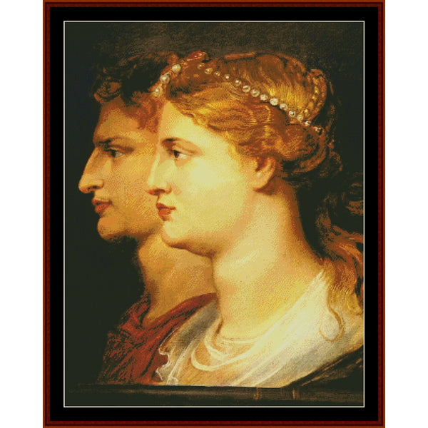 Counted Cross Stitch Pattern: Agrippa and Germanicus by Peter Paul Rubens - Cross Stitch Collectibles - A framed classical portrait painting showing two side-profiled figures, likely Romans or Greeks, with warm golden skin tones, red drapery, and pearl headpieces against a dark background