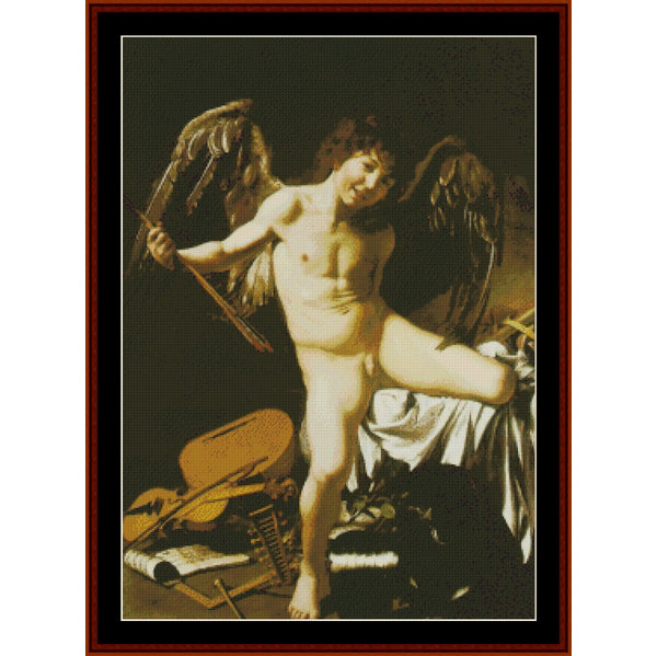 Counted Cross Stitch Pattern: Amor Victorious by Caravaggio - Cross Stitch Collectibles - Framed classical art print depicting a winged nude male figure with a bow and arrow, standing over a draped figure and musical instruments
