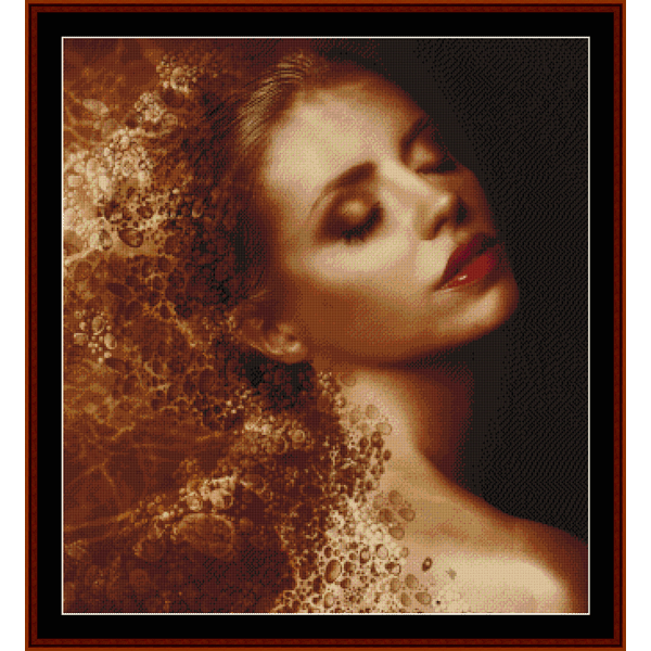 Counted Cross Stitch Pattern by Cross Stitch Collectibles of a woman with flowing hair in a brown and white color palette.