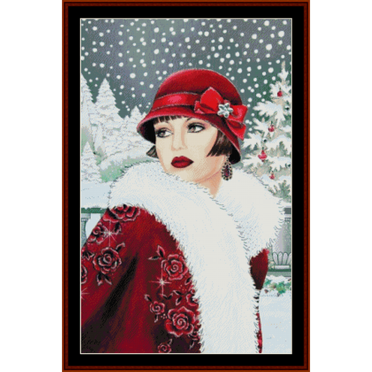 Counted Cross Stitch Pattern by Cross Stitch Collectibles featuring a woman in a red coat and hat with a white fur collar, decorated with a red bow, against a wintry landscape background with snowflakes.