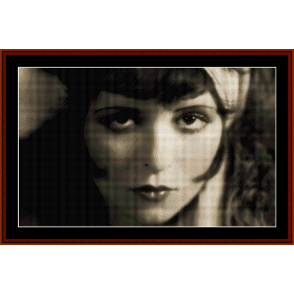 Counted Cross Stitch Pattern by Cross Stitch Collectibles depicting a vintage portrait of a woman. The pattern is designed for easy reading with large-print text 