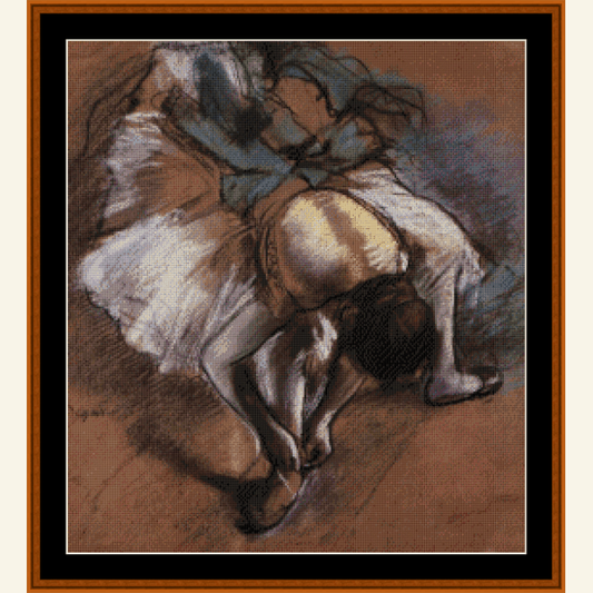Counted Cross Stitch Pattern by Cross Stitch Collectibles depicting a dancer adjusting her slipper, based on the artwork by Edgar Degas.