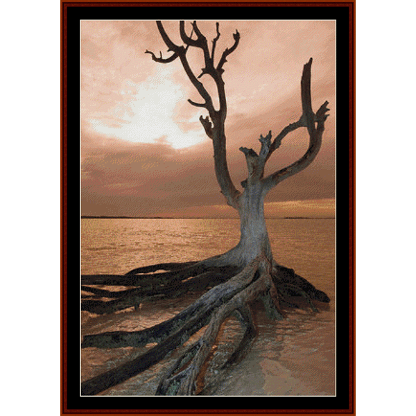Counted Cross Stitch Pattern by Cross Stitch Collectibles of a dead tree on a harbour island with a sunset background.