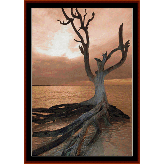 Counted Cross Stitch Pattern by Cross Stitch Collectibles of a dead tree on a harbour island with a sunset background.