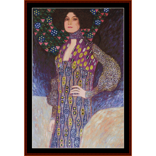 Counted Cross Stitch Pattern by Cross Stitch Collectibles  depicting a woman in a colorful, patterned dress with a serious expression