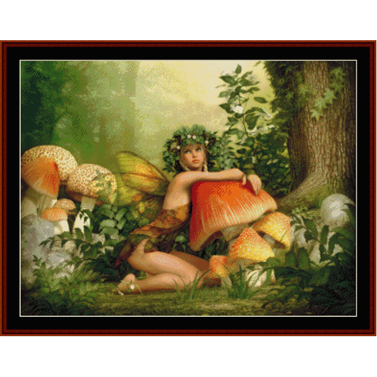 Counted Cross Stitch Pattern by Cross Stitch Collectibles depicting a fairy sitting in a forest surrounded by mushrooms and foliage.