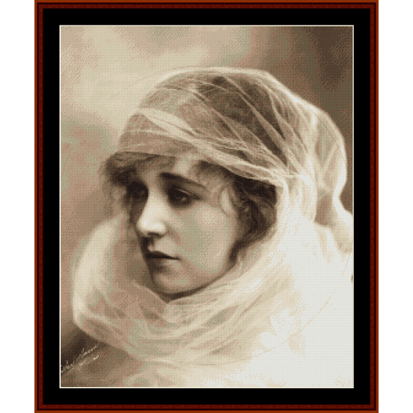 A vintage portrait Counted Cross Stitch Pattern by Cross Stitch Collectibles  picture, framed, featuring a woman with a veil over her head.