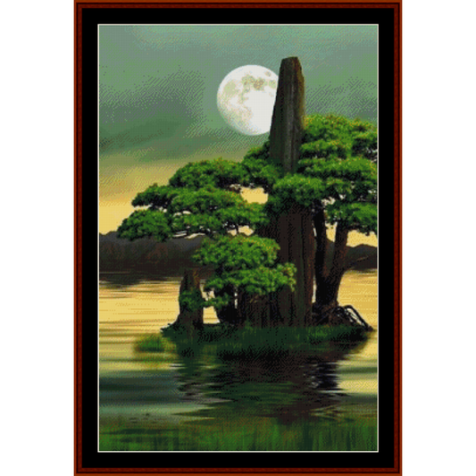 Counted Cross Stitch Pattern by Cross Stitch Collectibles  featuring a green tree on an island at moonlight, with a calm ocean and moon in the background.