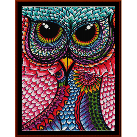 A colorful Counted Cross Stitch Pattern by Cross Stitch Collectibles  of an owl with detailed feathers and vibrant eyes.