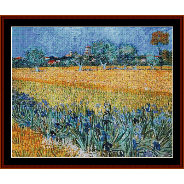 Counted Cross Stitch Pattern by Cross Stitch Collectibles of a famous painting featuring a field with blue flowers and a town in the background.