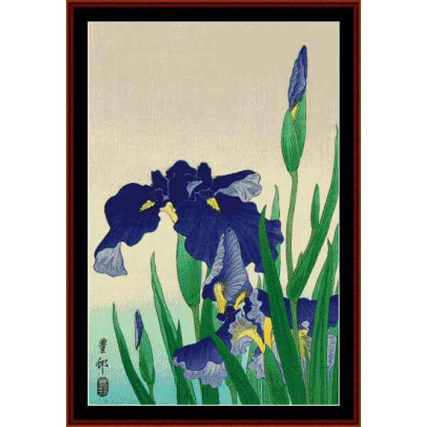 Counted Cross Stitch Pattern by Cross Stitch Collectibles of blue irises on a beige background