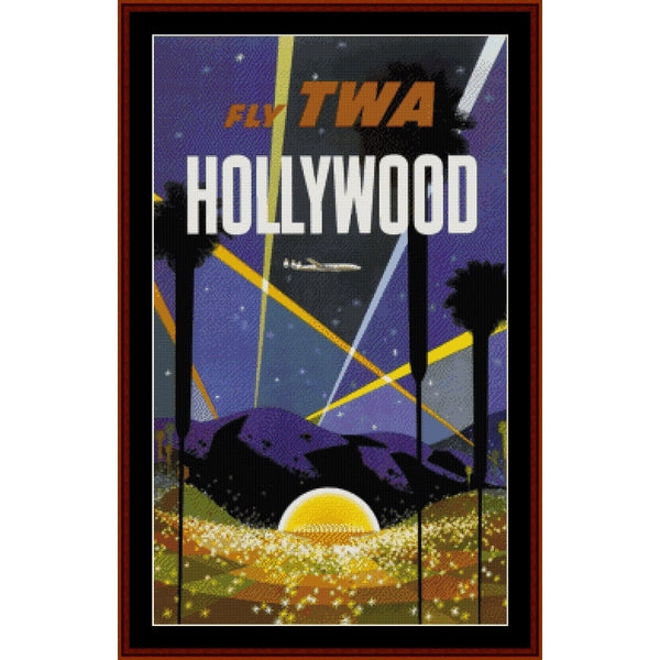 Vintage-style poster Counted Cross Stitch Pattern by Cross Stitch Collectibles with 'Fly TWA Hollywood' text, palm trees, and airplane against a night sky.