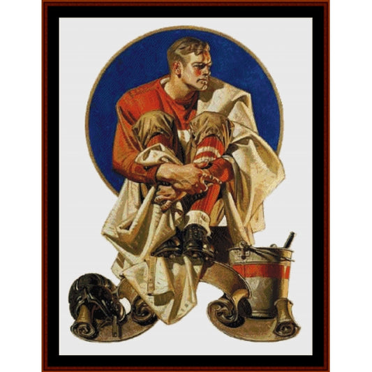 Counted Cross Stitch Pattern by Cross Stitch Collectibles of a man in a red and beige outfit with a blue circular background
