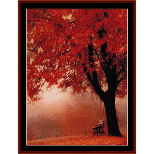 Counted Cross Stitch Pattern by Cross Stitch Collectibles of a tree with red leaves and a bench in a misty forest