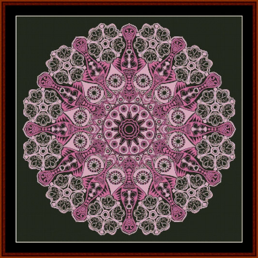 Mandala Counted Cross Stitch Pattern by Cross Stitch Collectibles with pink and black colors on a dark background