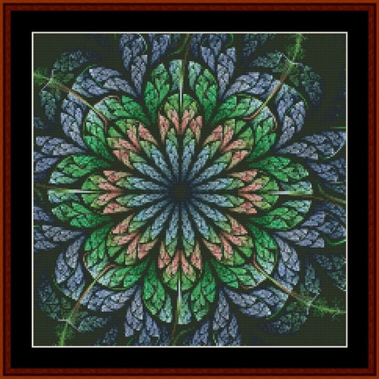 Mandala Counted Cross Stitch Pattern by Cross Stitch Collectibles with green and blue colors on a dark background