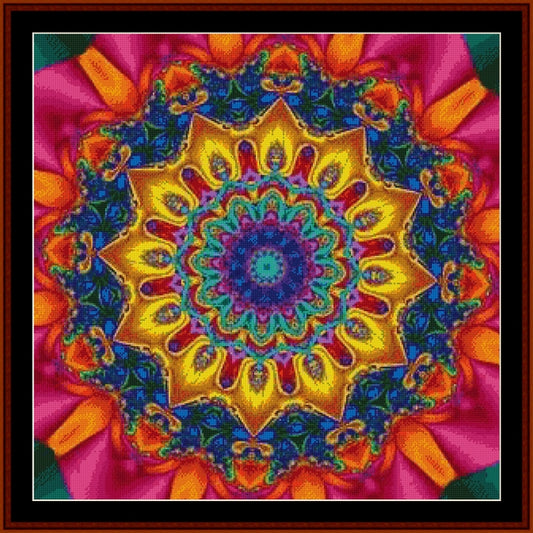 Colorful mandala Counted Cross Stitch Pattern by Cross Stitch Collectibles with vibrant colors on a pink and orange background