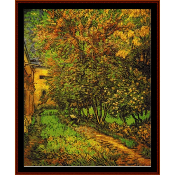 Counted Cross Stitch Pattern by Cross Stitch Collectibles of a garden scene with trees and a building.